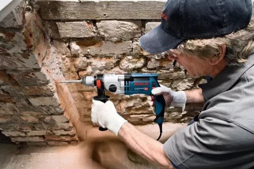 Bosch GSB 24-2 Ütvefúrógép + gyorsbefogó tokmány 1100W (060119C801)